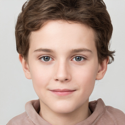 Joyful white child female with short  brown hair and grey eyes