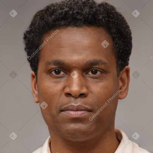 Neutral black young-adult male with short  brown hair and brown eyes