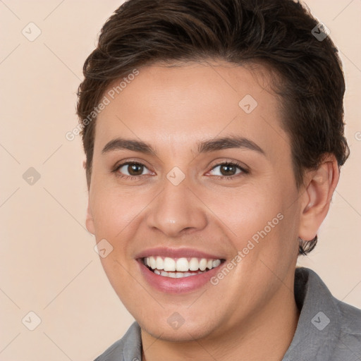 Joyful white young-adult female with short  brown hair and brown eyes