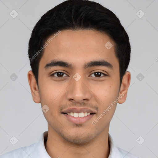 Joyful latino young-adult male with short  black hair and brown eyes