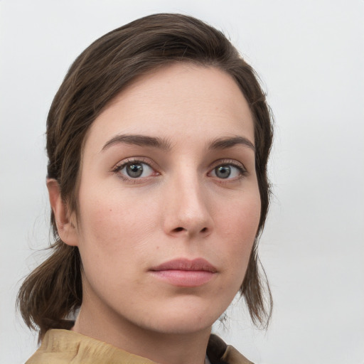 Neutral white young-adult female with medium  brown hair and grey eyes