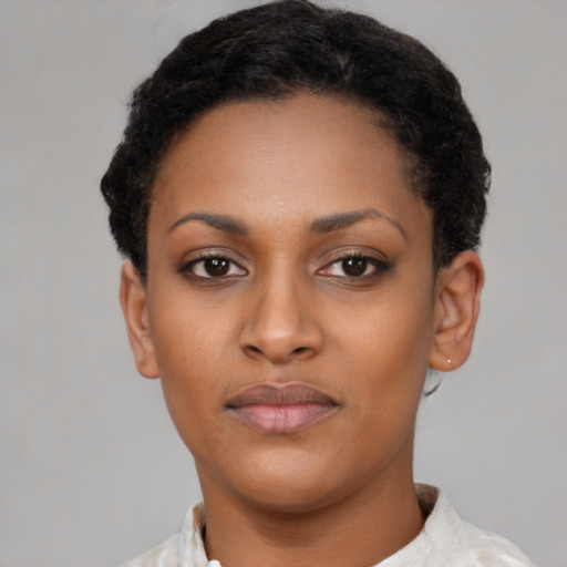 Neutral latino young-adult female with short  black hair and brown eyes