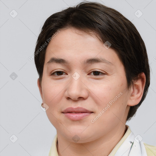 Joyful asian young-adult female with short  brown hair and brown eyes