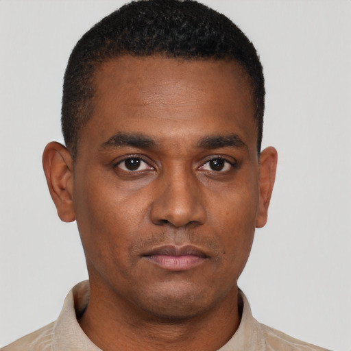 Neutral black young-adult male with short  black hair and brown eyes