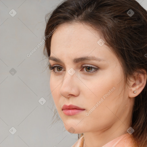 Neutral white young-adult female with medium  brown hair and brown eyes