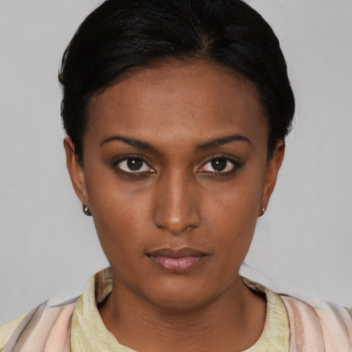 Neutral latino young-adult female with short  black hair and brown eyes