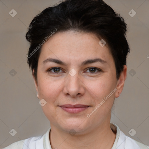 Joyful white adult female with short  brown hair and brown eyes