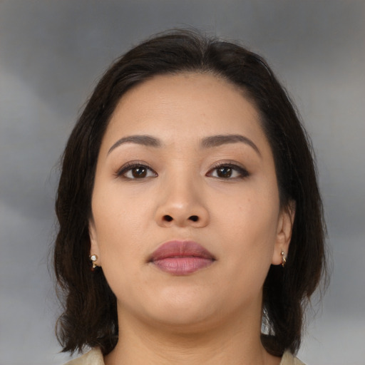 Neutral asian young-adult female with medium  brown hair and brown eyes