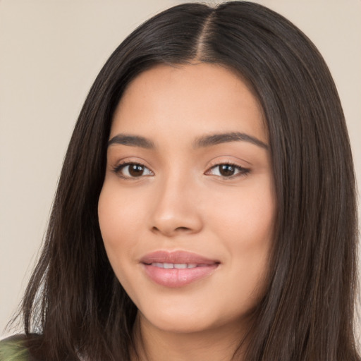 Joyful white young-adult female with long  black hair and brown eyes