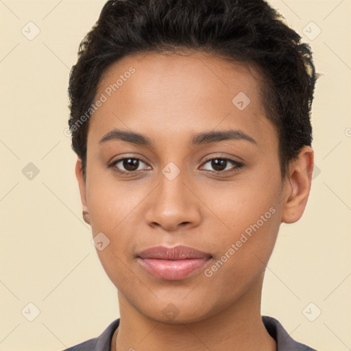 Joyful latino young-adult female with short  brown hair and brown eyes