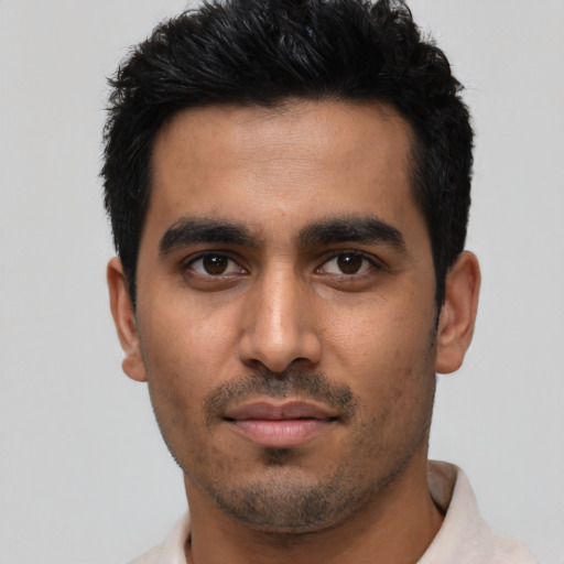 Neutral latino young-adult male with short  black hair and brown eyes