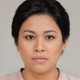 Neutral asian young-adult female with medium  black hair and brown eyes