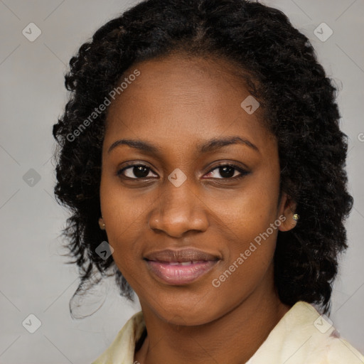 Joyful black young-adult female with medium  black hair and brown eyes