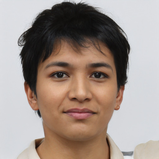 Joyful latino young-adult female with short  brown hair and brown eyes