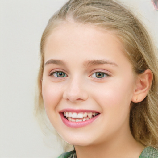 Joyful white child female with long  brown hair and blue eyes