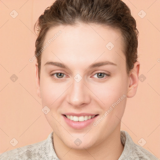 Joyful white young-adult female with short  brown hair and grey eyes