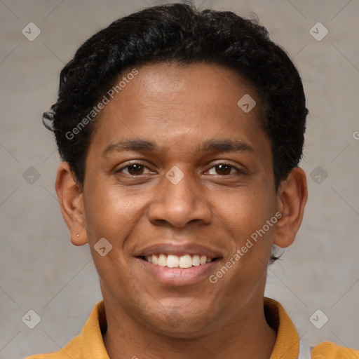 Joyful latino adult male with short  brown hair and brown eyes