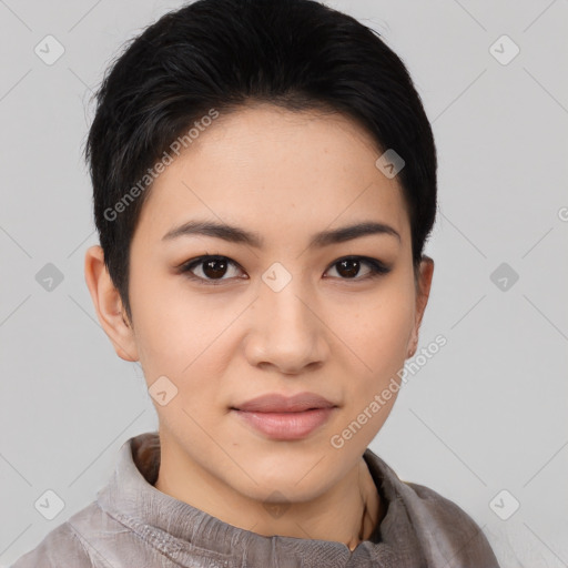 Joyful asian young-adult female with short  black hair and brown eyes