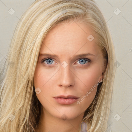 Neutral white young-adult female with long  brown hair and blue eyes