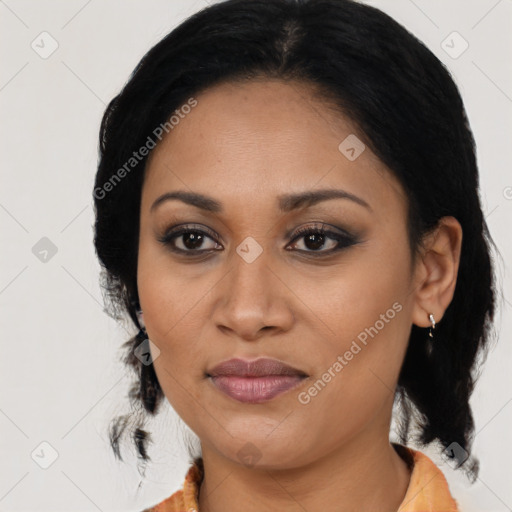 Joyful latino young-adult female with medium  black hair and brown eyes