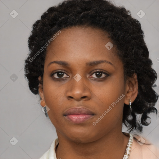 Neutral black young-adult female with short  brown hair and brown eyes