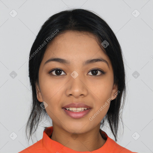 Joyful asian young-adult female with medium  black hair and brown eyes