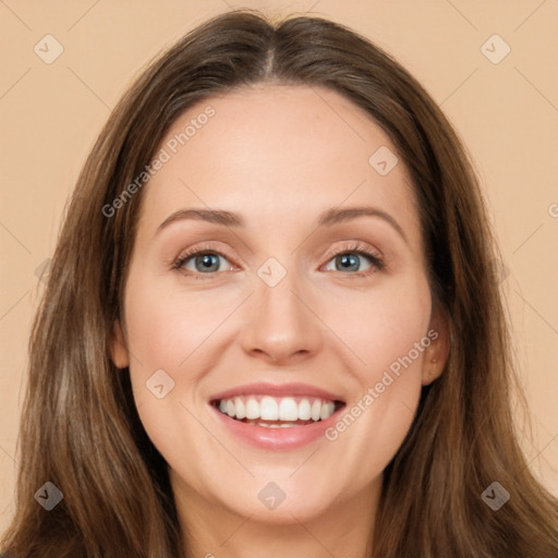 Joyful white young-adult female with long  brown hair and green eyes