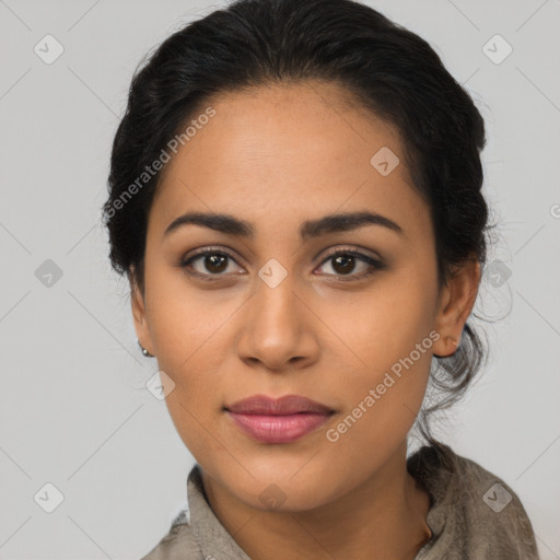 Joyful latino young-adult female with long  black hair and brown eyes