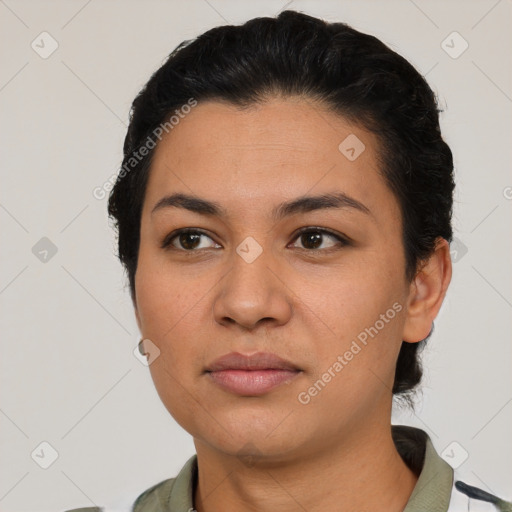 Neutral latino young-adult female with short  black hair and brown eyes