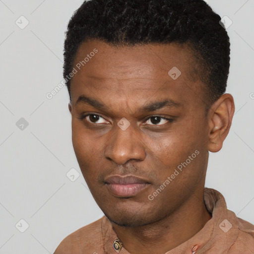 Neutral black young-adult male with short  black hair and brown eyes