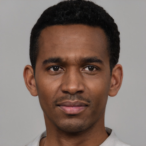 Neutral black young-adult male with short  black hair and brown eyes