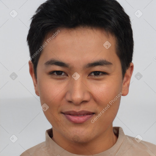 Joyful asian young-adult male with short  brown hair and brown eyes