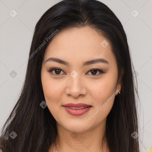 Joyful asian young-adult female with long  brown hair and brown eyes