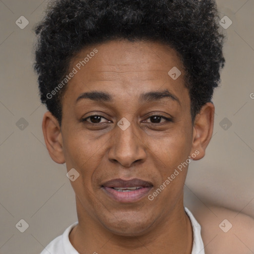 Joyful black adult female with short  brown hair and brown eyes