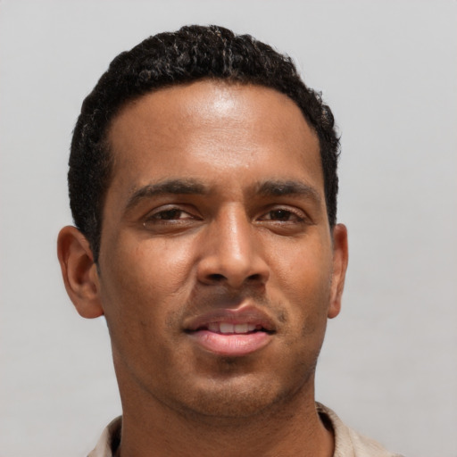 Neutral latino young-adult male with short  brown hair and brown eyes