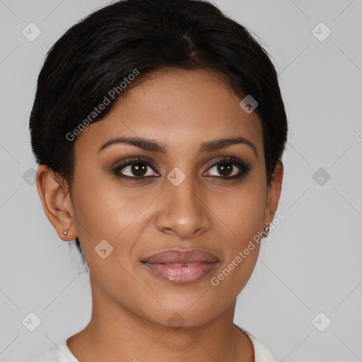 Joyful latino young-adult female with short  brown hair and brown eyes