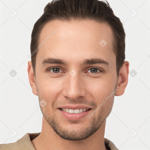 Joyful white young-adult male with short  brown hair and brown eyes