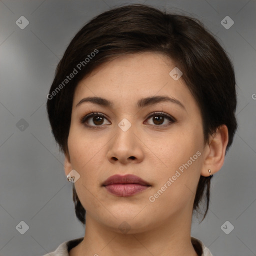 Neutral white young-adult female with medium  brown hair and brown eyes