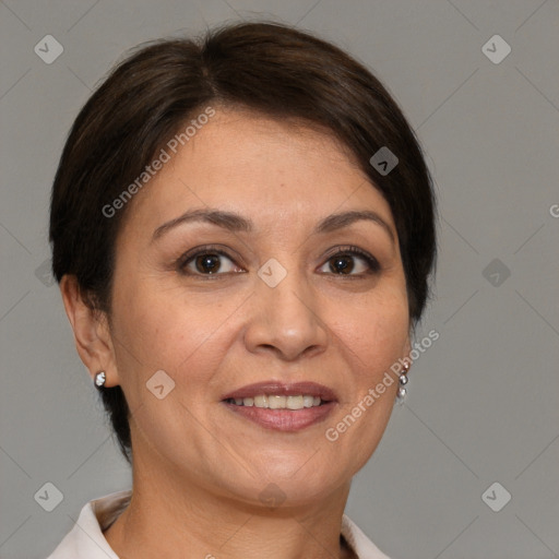 Joyful white adult female with short  brown hair and brown eyes