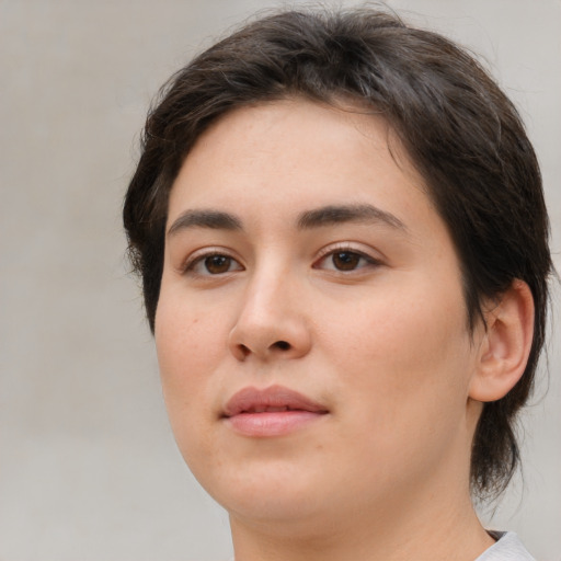 Neutral white young-adult female with medium  brown hair and brown eyes