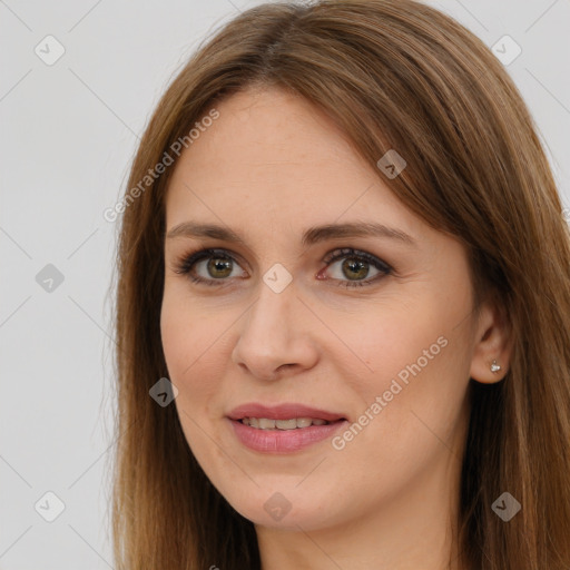 Joyful white young-adult female with long  brown hair and brown eyes