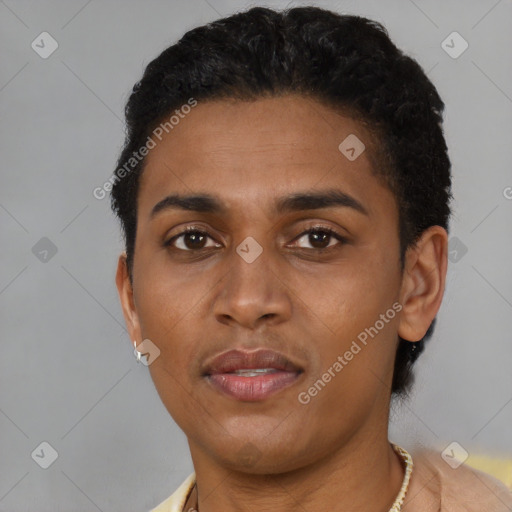 Joyful latino young-adult female with short  brown hair and brown eyes