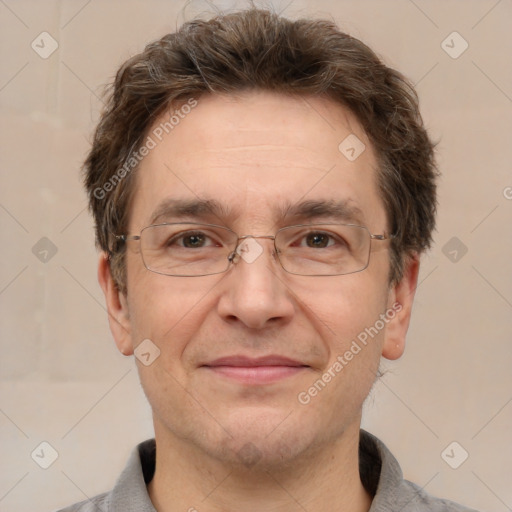 Joyful white adult male with short  brown hair and grey eyes