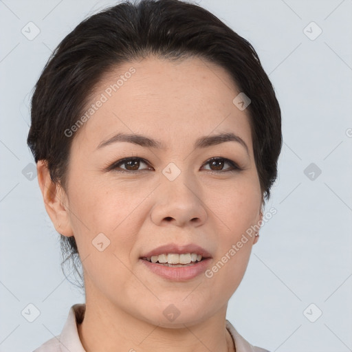 Joyful asian young-adult female with short  brown hair and brown eyes