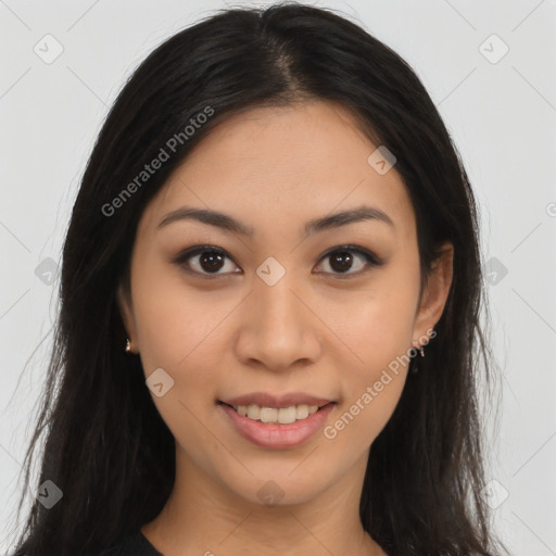 Joyful latino young-adult female with long  brown hair and brown eyes