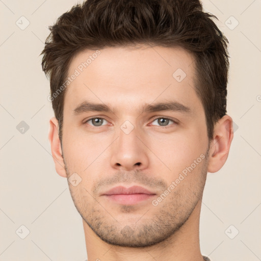 Neutral white young-adult male with short  brown hair and brown eyes