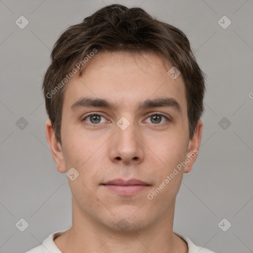 Neutral white young-adult male with short  brown hair and brown eyes