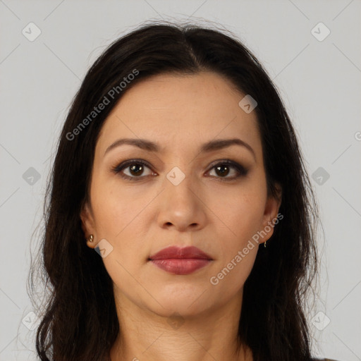 Joyful latino young-adult female with long  brown hair and brown eyes