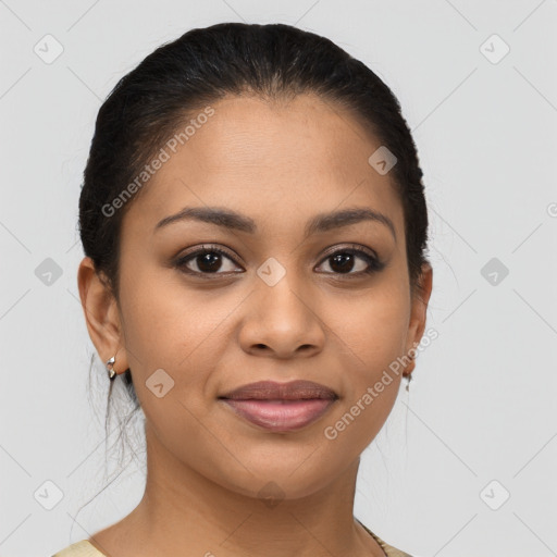 Joyful latino young-adult female with medium  brown hair and brown eyes