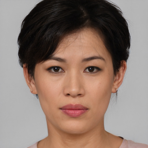 Neutral asian young-adult female with short  black hair and brown eyes